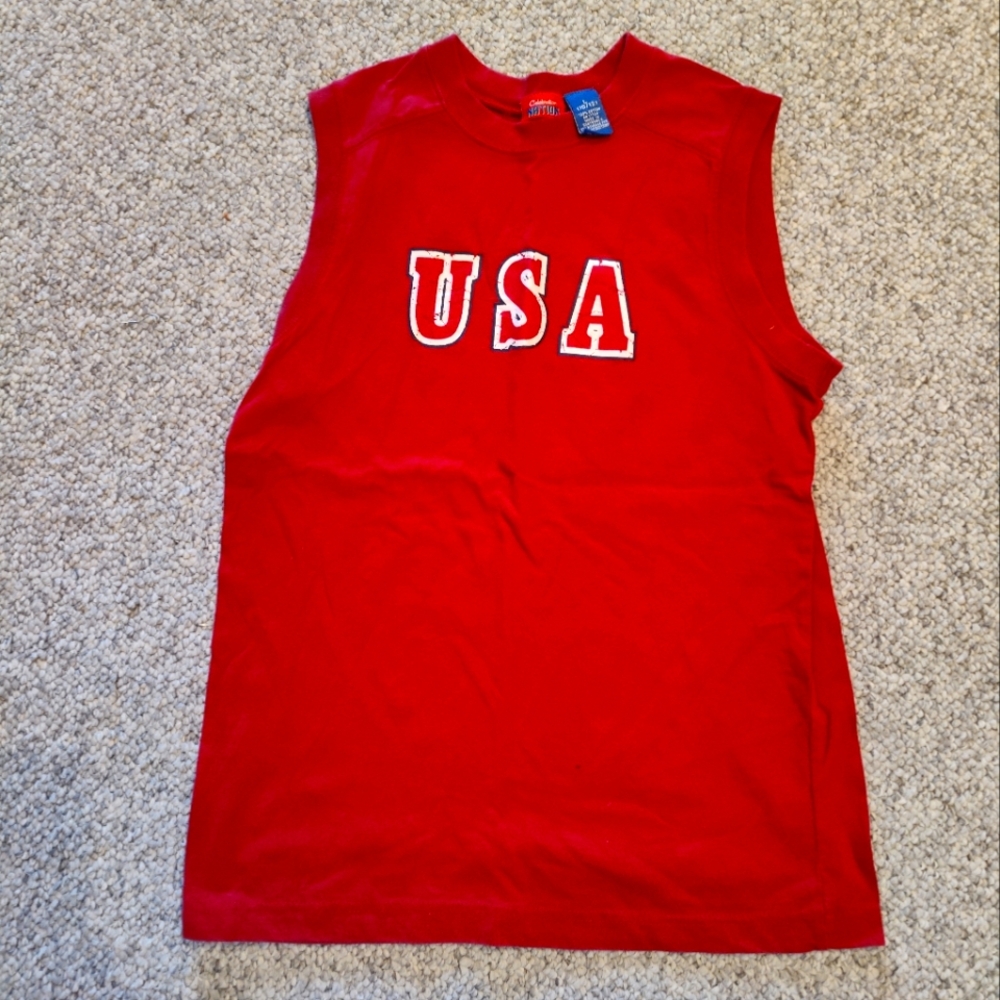 Like new red sleeveless USA tee. Comfy and casual. Great for the beach!  Boy's L